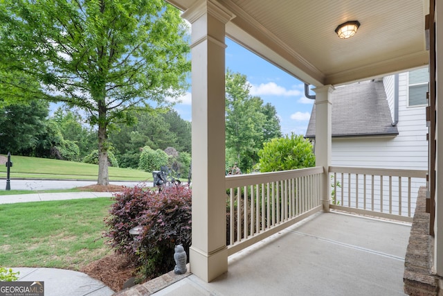 1537 Maplecliff Way, Sugar Hill, GA 30518 - covered porch featuring a yard and view of scattered trees