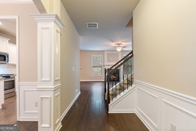 1537 Maplecliff Way, Sugar Hill, GA 30518 - hallway featuring dark wood finished floors, stairs, and baseboards