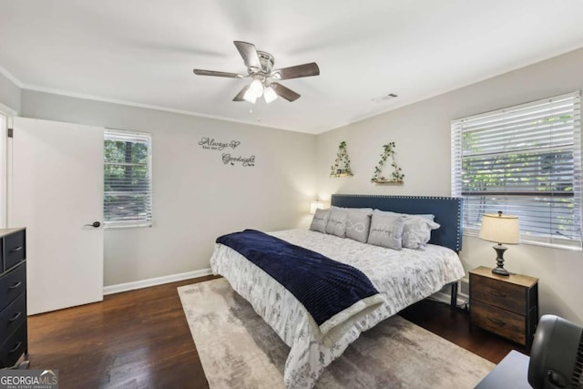 5222 Skyline Dr, Stone Mountain, GA 30083 - bedroom with wood finished floors, baseboards, and ceiling fan