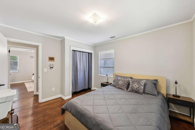 5222 Skyline Dr, Stone Mountain, GA 30083 - bedroom with wood finished floors, ornamental molding, and baseboards