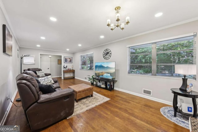 5222 Skyline Dr, Stone Mountain, GA 30083 - living room featuring a chandelier, baseboards, recessed lighting, wood finished floors, and crown molding