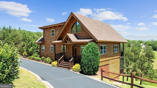 325 Emelia Dr, Morganton, GA 30560 - cabin with covered porch and roof with shingles