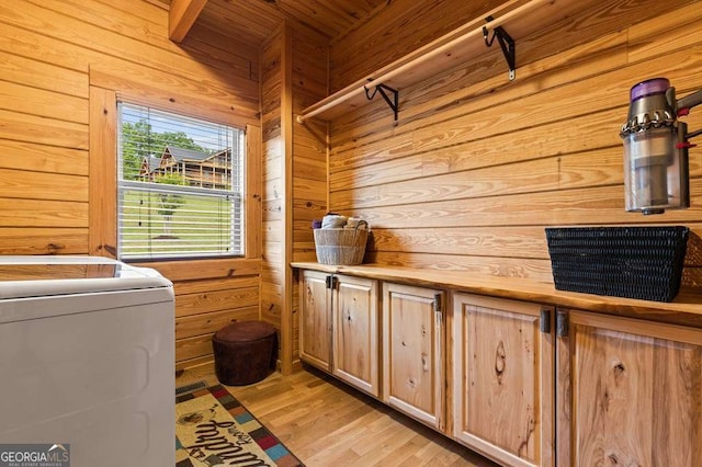 325 Emelia Dr, Morganton, GA 30560 - washroom featuring cabinet space, wood walls, washer / dryer, and light wood finished floors