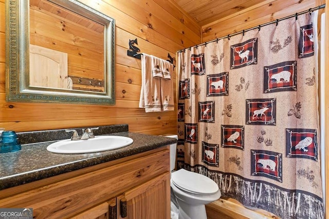 325 Emelia Dr, Morganton, GA 30560 - bathroom with vanity, wood walls, toilet, and a shower with shower curtain