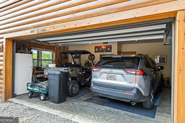 325 Emelia Dr, Morganton, GA 30560 - garage with freestanding refrigerator