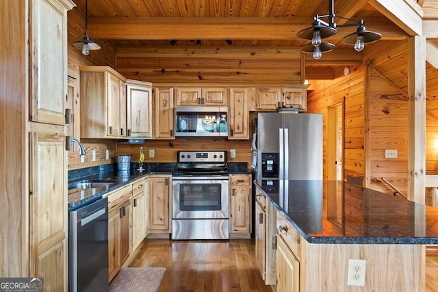 325 Emelia Dr, Morganton, GA 30560 - kitchen with appliances with stainless steel finishes, wood walls, light brown cabinetry, dark wood finished floors, and wood ceiling with exposed beams