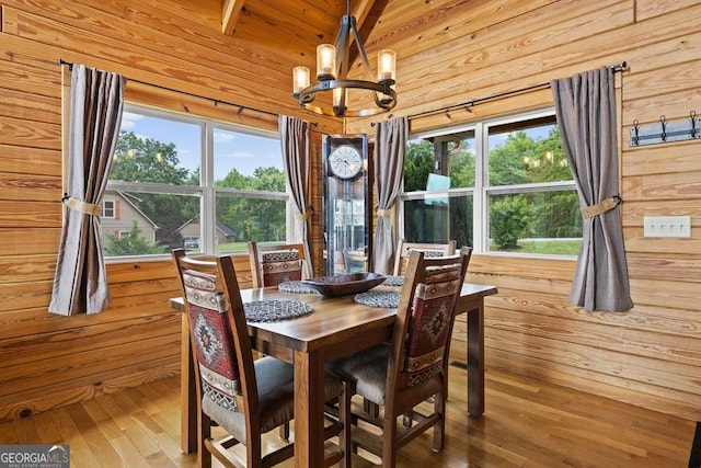 325 Emelia Dr, Morganton, GA 30560 - dining space featuring a chandelier, hardwood / wood-style flooring, wooden walls, plenty of natural light, and wooden ceiling