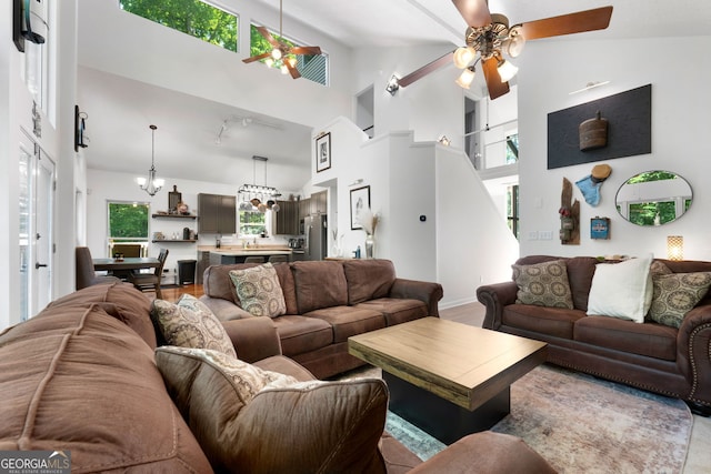 425 Wagers Mill Rd, Newnan, GA 30263 - living room featuring a ceiling fan, high vaulted ceiling, plenty of natural light, and track lighting