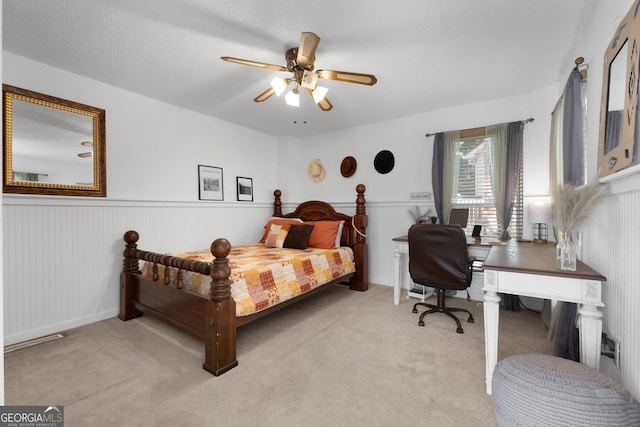 425 Wagers Mill Rd, Newnan, GA 30263 - bedroom featuring light carpet, an office area, wainscoting, and ceiling fan