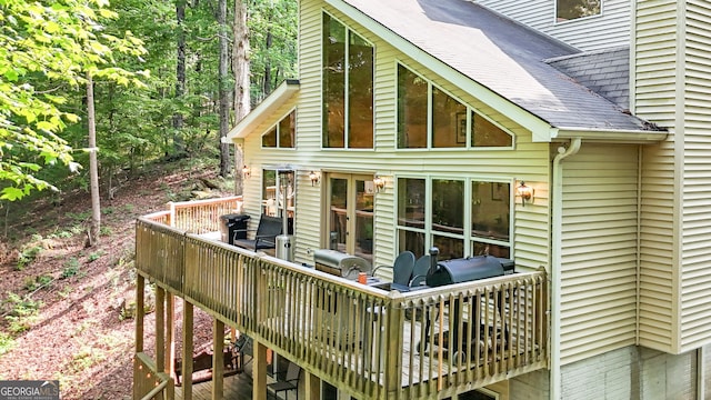425 Wagers Mill Rd, Newnan, GA 30263 - view of home's exterior featuring a shingled roof and a wooden deck
