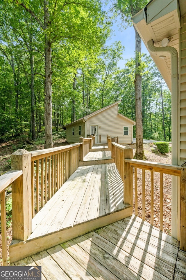 425 Wagers Mill Rd, Newnan, GA 30263 - wooden terrace with view of wooded area