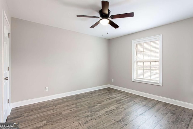 7 Villa Ct SE, Smyrna, GA 30080 - unfurnished room featuring wood finished floors, baseboards, and a ceiling fan