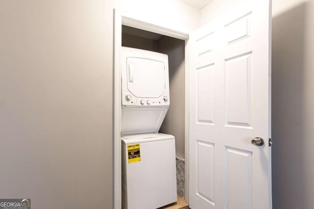 7 Villa Ct SE, Smyrna, GA 30080 - laundry room featuring stacked washing machine and dryer