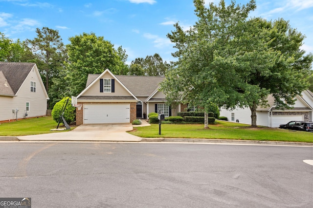 264 Baldwin Ct, Newnan, GA 30263 - view of front facade with driveway, brick siding, and a front lawn