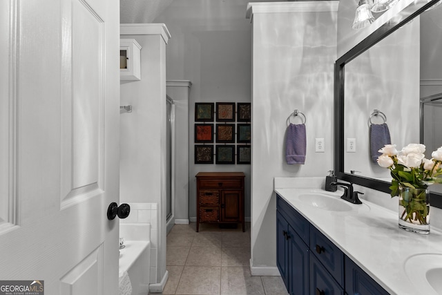 264 Baldwin Ct, Newnan, GA 30263 - full bathroom featuring a shower stall, double vanity, tile patterned flooring, and a bath