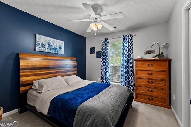 264 Baldwin Ct, Newnan, GA 30263 - bedroom featuring a textured ceiling, carpet, and a ceiling fan