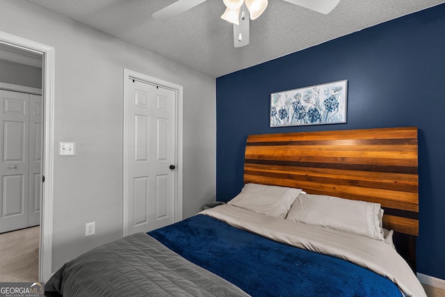 264 Baldwin Ct, Newnan, GA 30263 - bedroom featuring ceiling fan and a textured ceiling