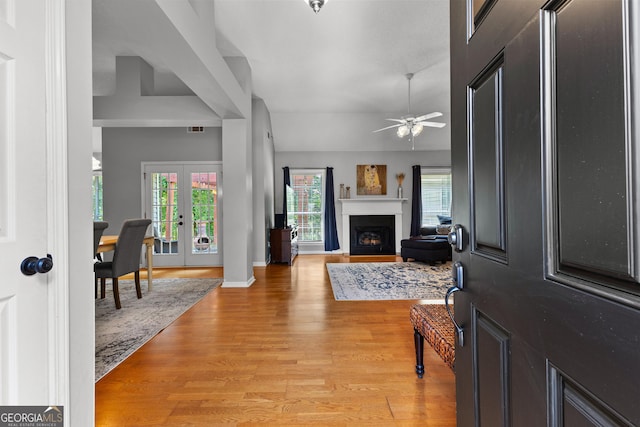 264 Baldwin Ct, Newnan, GA 30263 - entryway featuring a ceiling fan, french doors, plenty of natural light, and light wood finished floors
