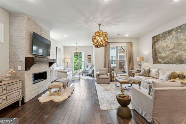 4355 Parkside Pl, Sandy Springs, GA 30342 - living area featuring a chandelier, hardwood / wood-style flooring, a fireplace, and recessed lighting