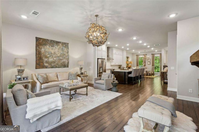 4355 Parkside Pl, Sandy Springs, GA 30342 - living room with a chandelier, dark wood-style flooring, baseboards, and recessed lighting