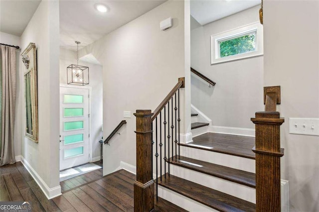4355 Parkside Pl, Sandy Springs, GA 30342 - stairs featuring wood finished floors, a chandelier, baseboards, and recessed lighting