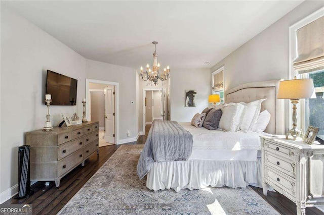 4355 Parkside Pl, Sandy Springs, GA 30342 - bedroom featuring a chandelier, dark wood-style floors, and baseboards