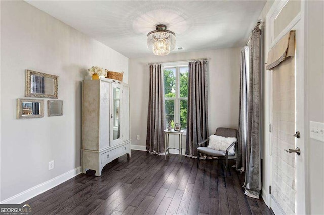 4355 Parkside Pl, Sandy Springs, GA 30342 - sitting room featuring dark wood-style flooring, a chandelier, and baseboards