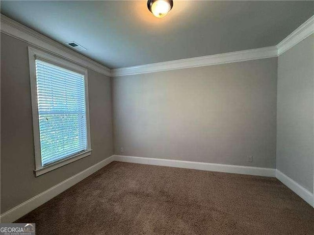 3488 Woodshade Dr, Loganville, GA 30052 - carpeted empty room featuring ornamental molding and baseboards