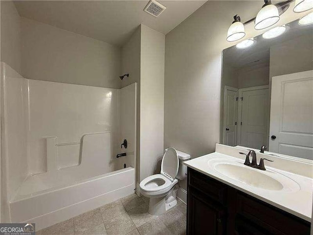 3488 Woodshade Dr, Loganville, GA 30052 - bathroom featuring toilet, vanity, bathtub / shower combination, and tile patterned floors
