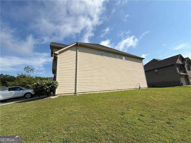 3488 Woodshade Dr, Loganville, GA 30052 - view of home's exterior with a yard