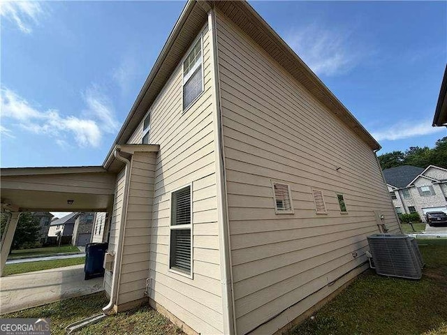3488 Woodshade Dr, Loganville, GA 30052 - view of side of home featuring central air condition unit
