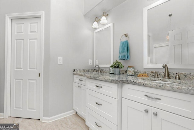 310 Medridge Dr, Alpharetta, GA 30022 - full bathroom featuring double vanity and baseboards