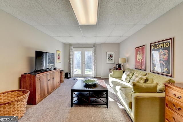 310 Medridge Dr, Alpharetta, GA 30022 - living room with light colored carpet, a paneled ceiling, and french doors