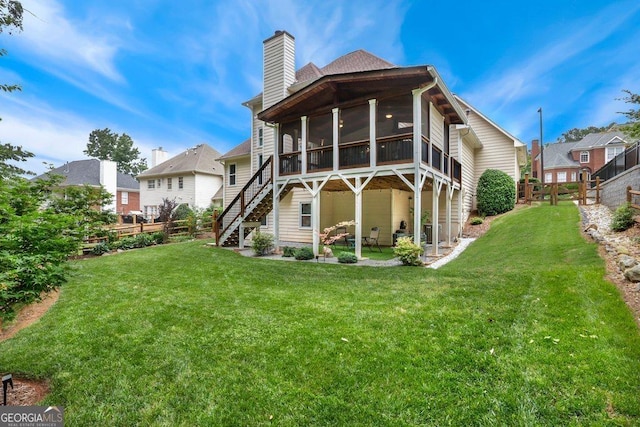 310 Medridge Dr, Alpharetta, GA 30022 - rear view of property with a sunroom, a chimney, a patio, and stairway