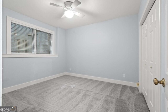 532 Coffee Cove Dr, Jasper, GA 30143 - unfurnished bedroom with a closet, carpet floors, baseboards, and ceiling fan
