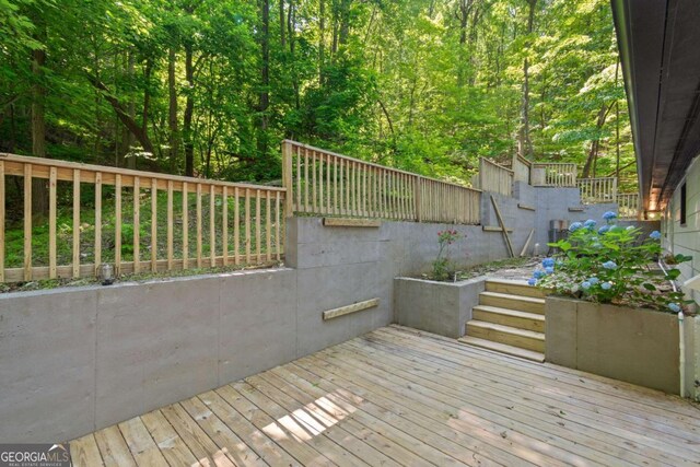532 Coffee Cove Dr, Jasper, GA 30143 - deck featuring stairway and a wooded view