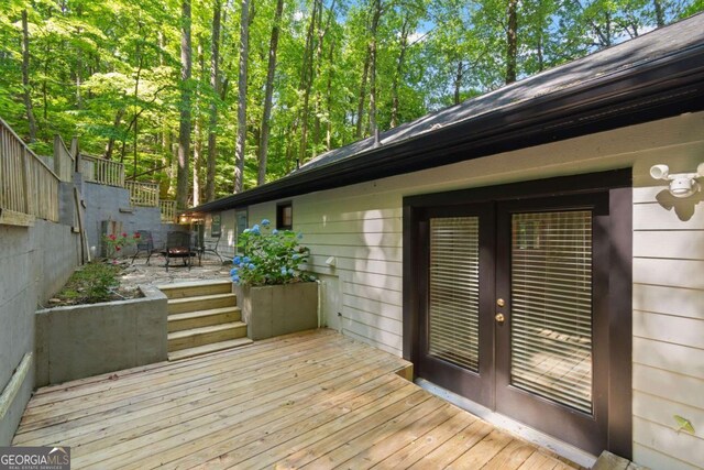 532 Coffee Cove Dr, Jasper, GA 30143 - wooden deck featuring french doors