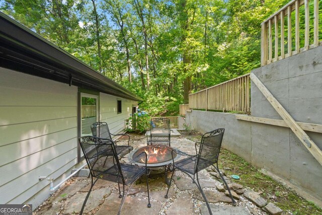532 Coffee Cove Dr, Jasper, GA 30143 - view of patio / terrace with a fire pit