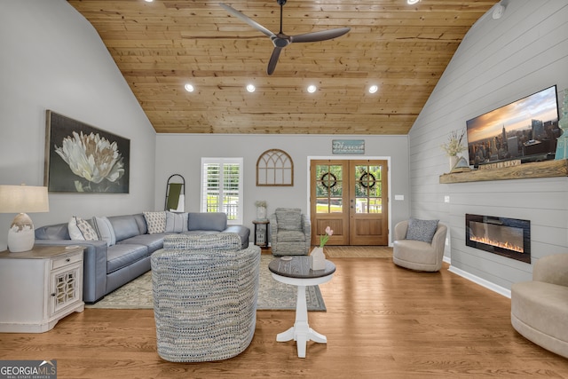 1035 Mcfarlin Bridge Rd, Carnesville, GA 30521 - living area with wood ceiling, high vaulted ceiling, recessed lighting, a ceiling fan, and a glass covered fireplace