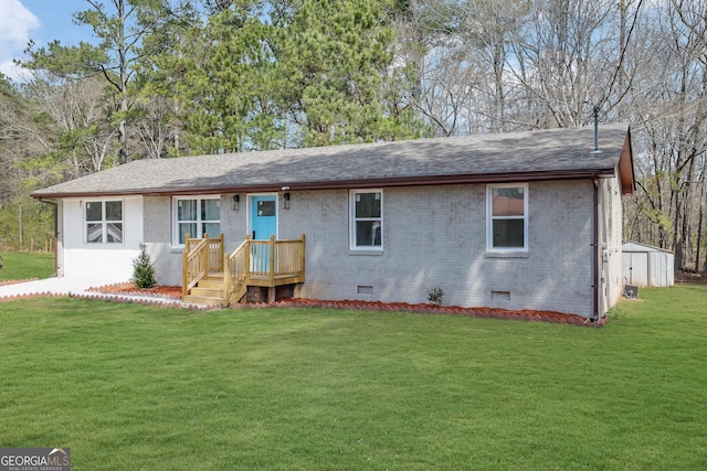 2030 Euclid St, Statham, GA 30666 - single story home with crawl space, brick siding, a storage shed, a front lawn, and roof with shingles