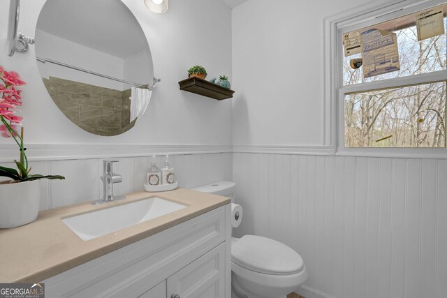 2030 Euclid St, Statham, GA 30666 - full bathroom featuring vanity, wainscoting, and curtained shower
