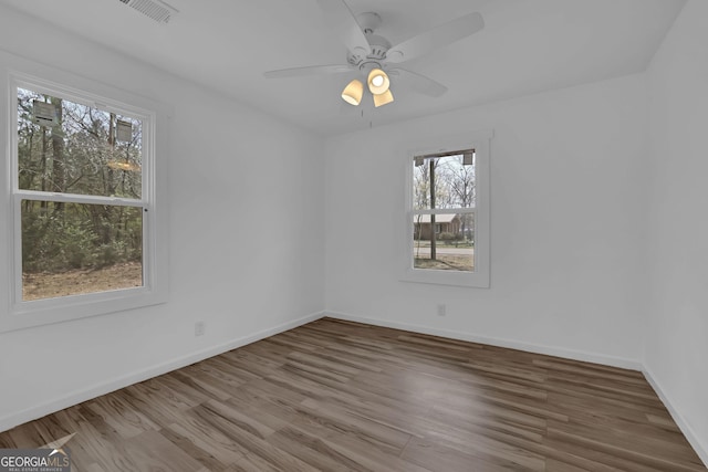 2030 Euclid St, Statham, GA 30666 - unfurnished room featuring wood finished floors and a ceiling fan