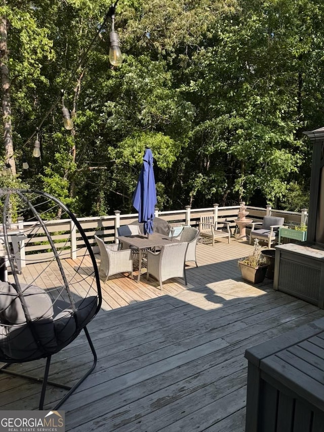 40 Legend Creek Chase, Douglasville, GA 30134 - deck featuring outdoor dining space and view of scattered trees