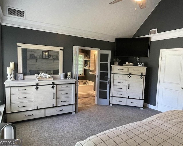 40 Legend Creek Chase, Douglasville, GA 30134 - carpeted bedroom featuring ornamental molding, lofted ceiling, and ensuite bath