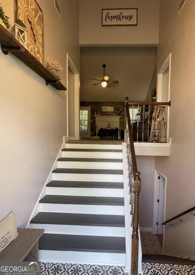 40 Legend Creek Chase, Douglasville, GA 30134 - staircase featuring ceiling fan and a high ceiling