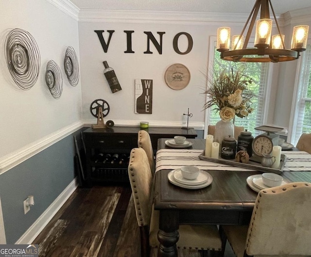 40 Legend Creek Chase, Douglasville, GA 30134 - dining space featuring a chandelier, crown molding, dark wood finished floors, and baseboards