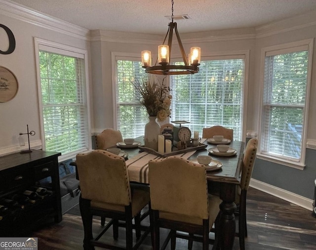40 Legend Creek Chase, Douglasville, GA 30134 - dining room with a chandelier, dark wood finished floors, a textured ceiling, and ornamental molding