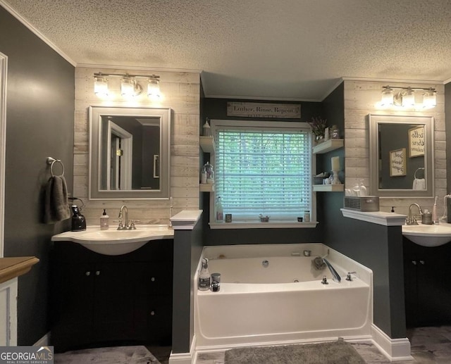 40 Legend Creek Chase, Douglasville, GA 30134 - full bathroom featuring a textured ceiling, crown molding, two vanities, a bath, and decorative backsplash