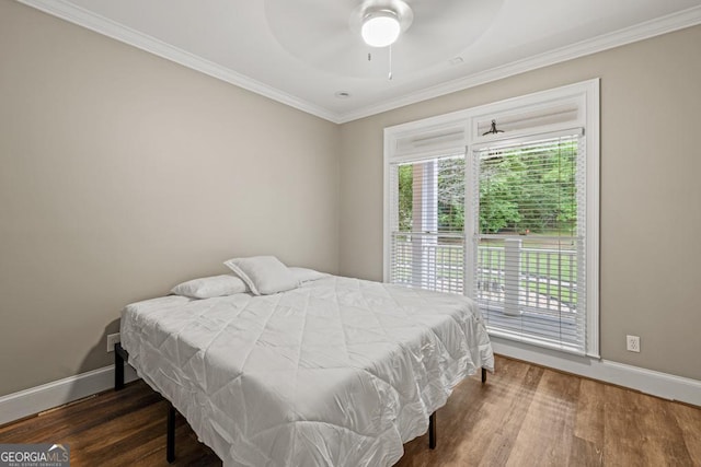 2230 Ewing Chapel Rd, Dacula, GA 30019 - bedroom with crown molding, wood finished floors, and ceiling fan