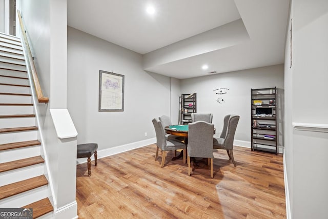 2230 Ewing Chapel Rd, Dacula, GA 30019 - dining room with stairs, light wood finished floors, and recessed lighting